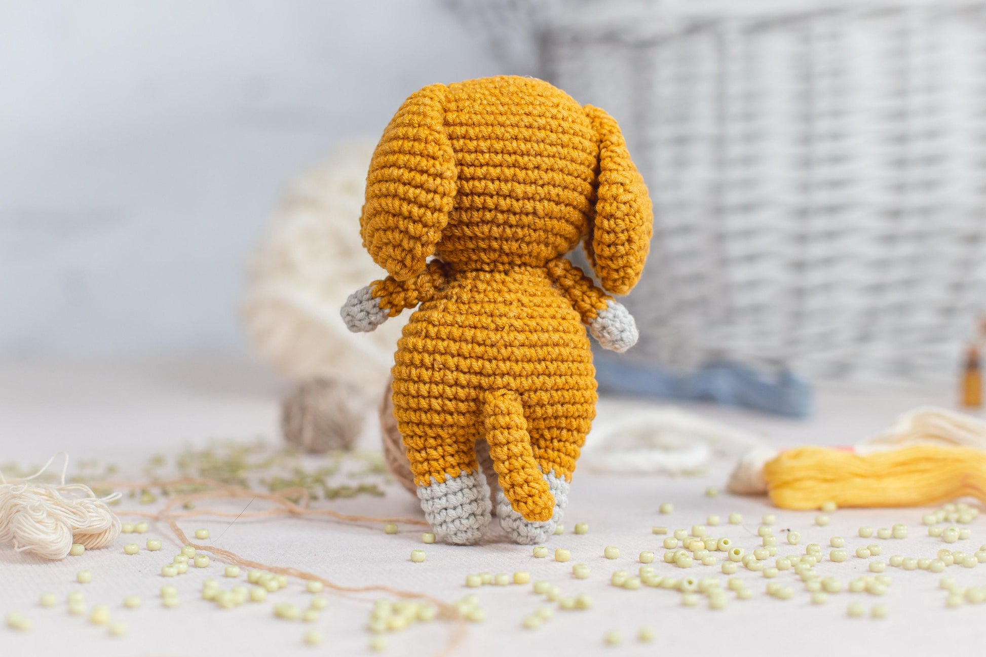 a crocheted stuffed animal sitting on top of a table