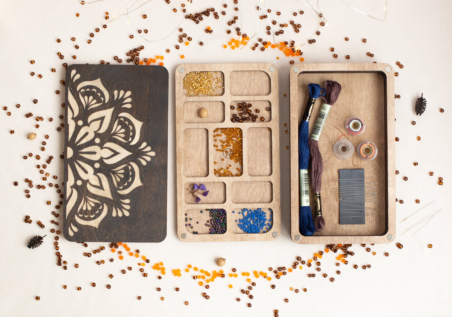 a wooden box filled with lots of crafting supplies
