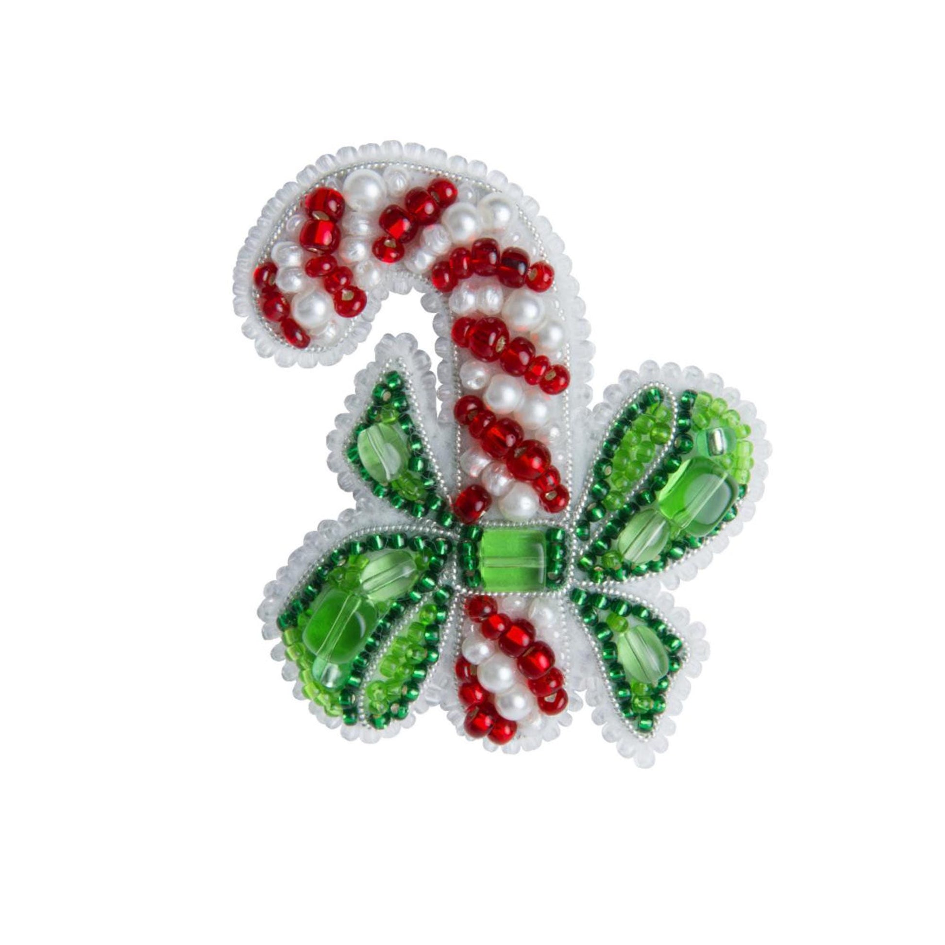 a green and red brooch with a candy cane