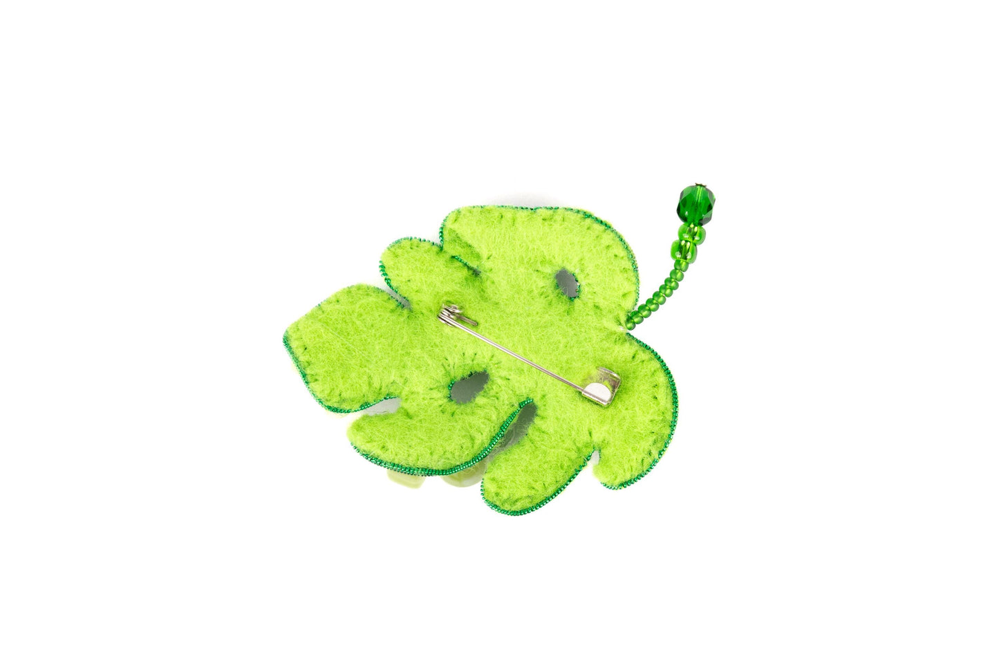 a green broccoli flower with a green stem