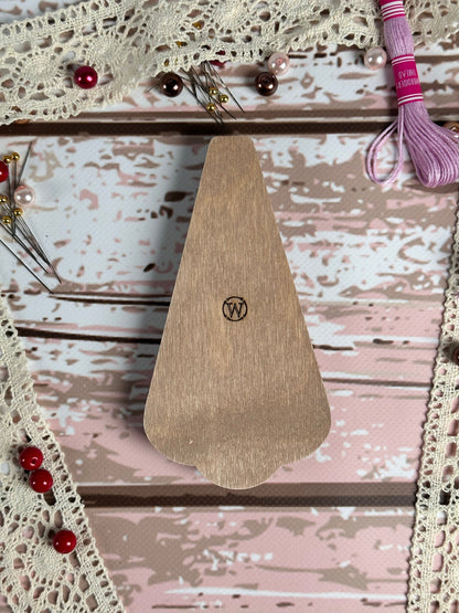 a piece of wood sitting on top of a table