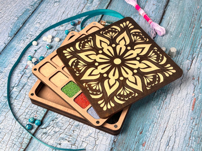 a set of three wooden coasters sitting on top of a wooden table