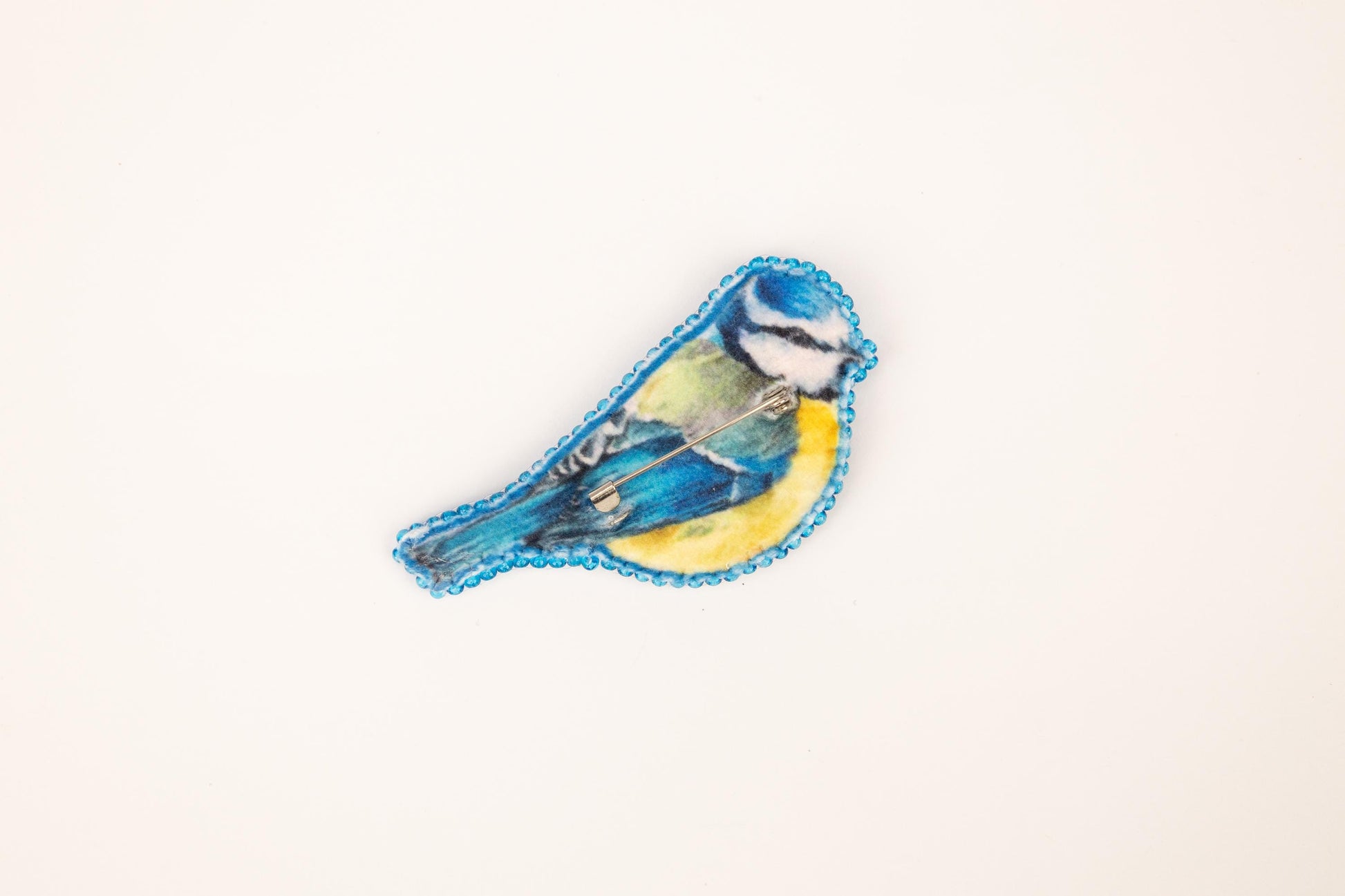 a picture of a blue bird on a white background