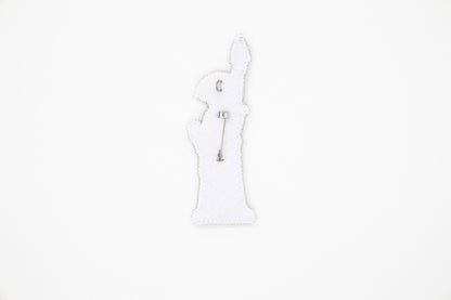 a picture of a white statue of liberty