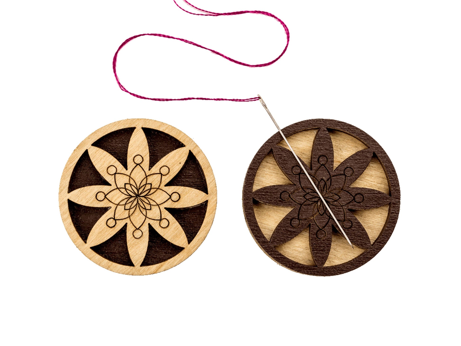 a wooden ornament with a string attached to it