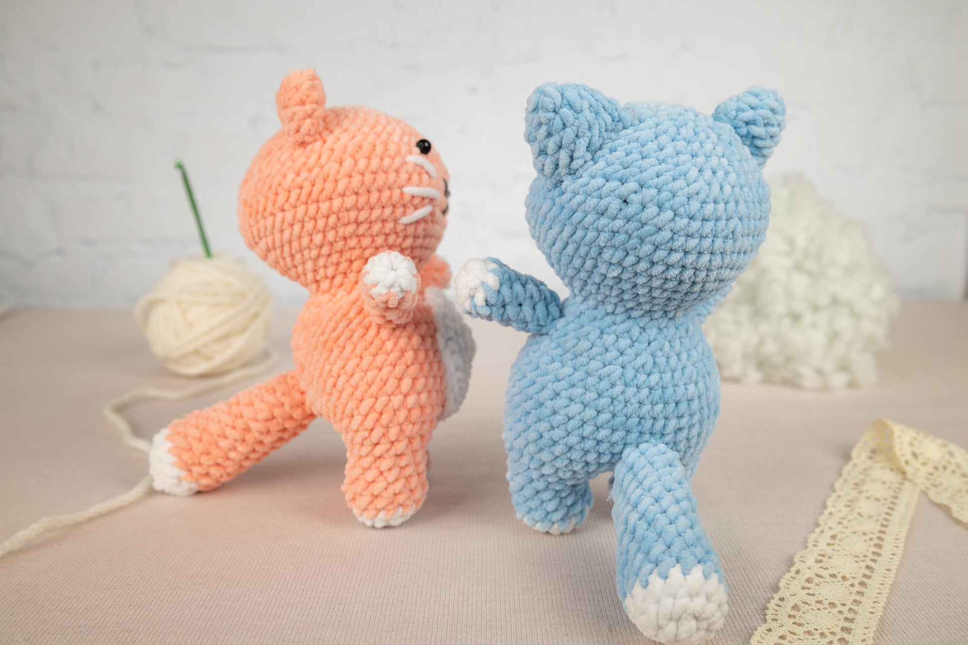 a couple of stuffed animals sitting next to each other