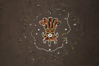 a picture of a hand with beads and beads around it