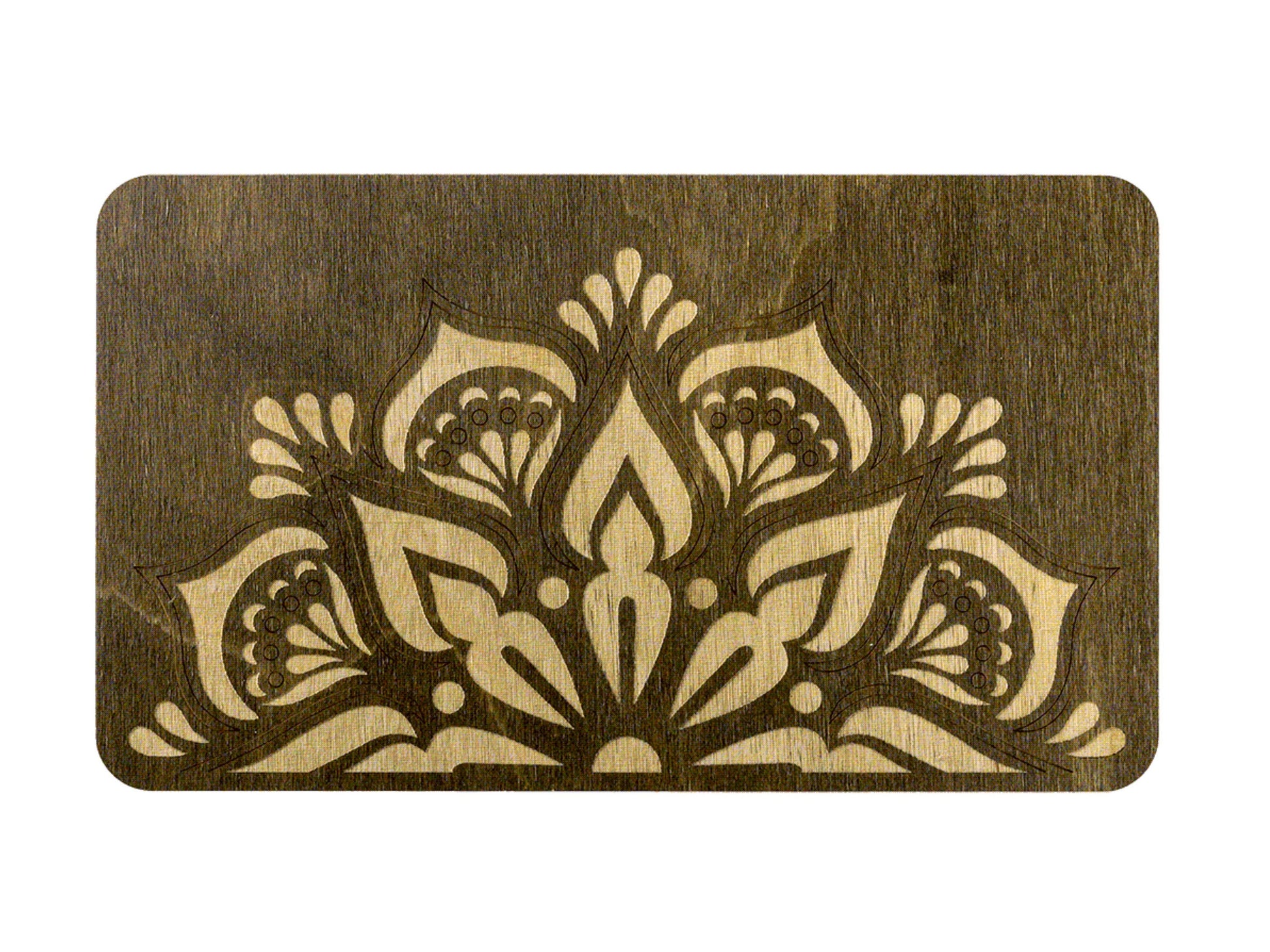 a wooden cutting board with a design on it