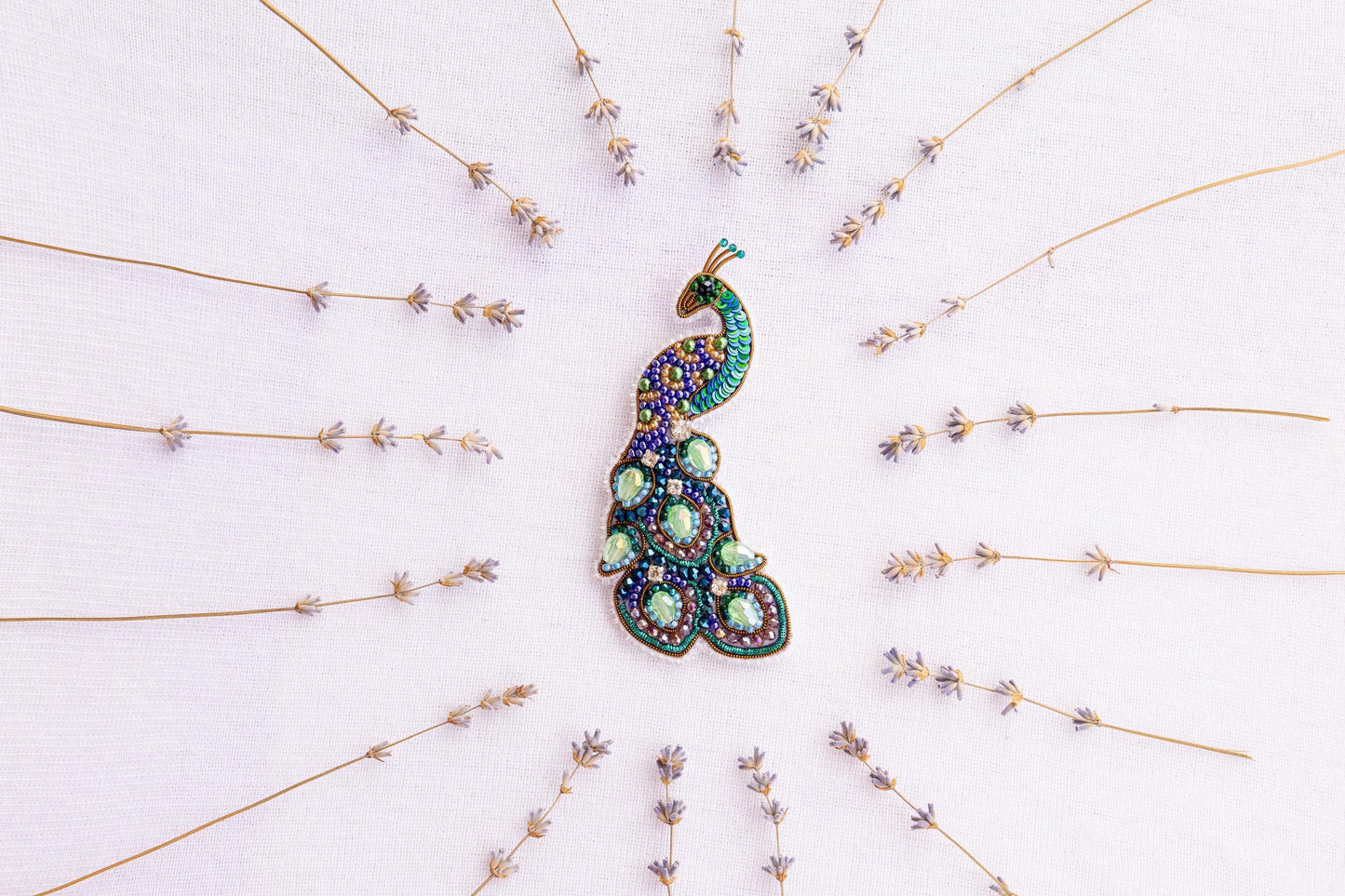 a brooch sitting on top of a white table