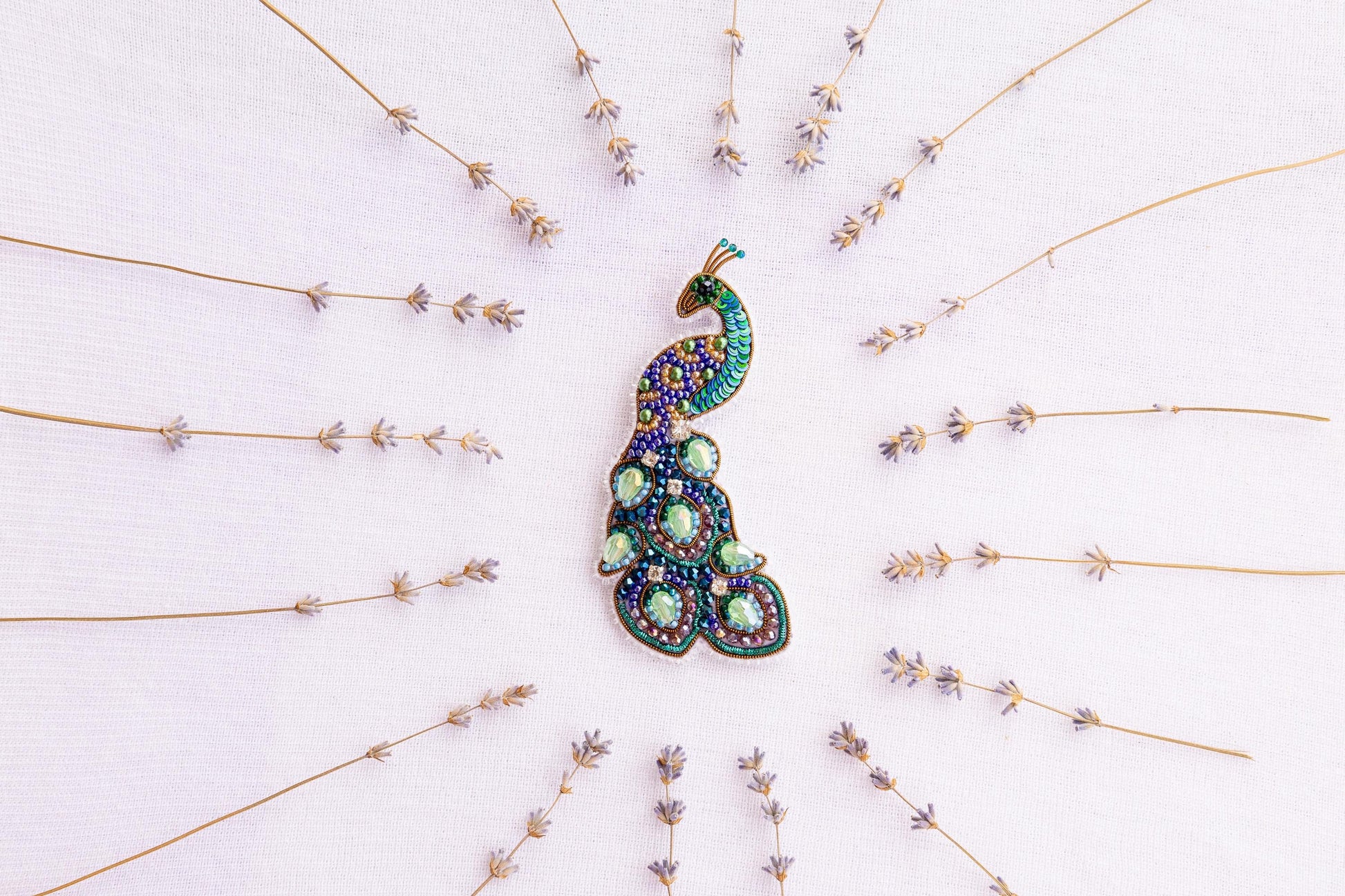 a brooch sitting on top of a white table