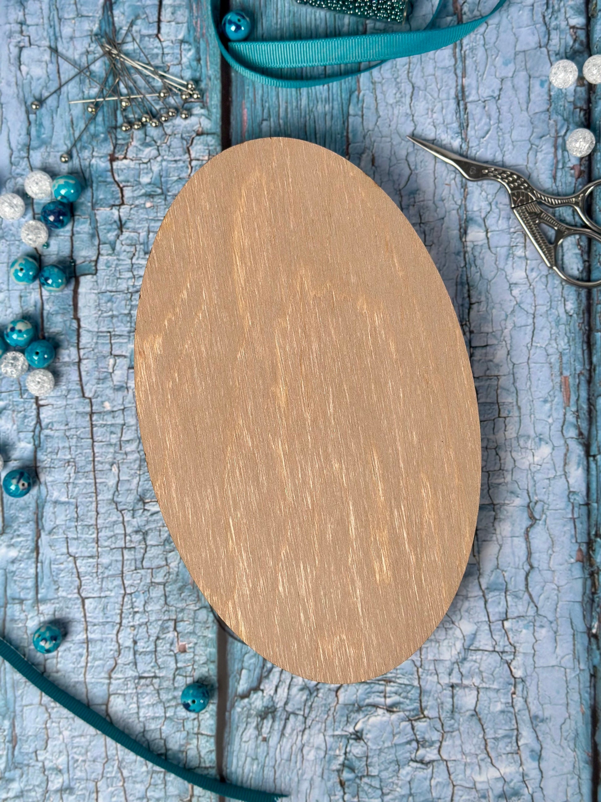 a round wooden board sitting on top of a table
