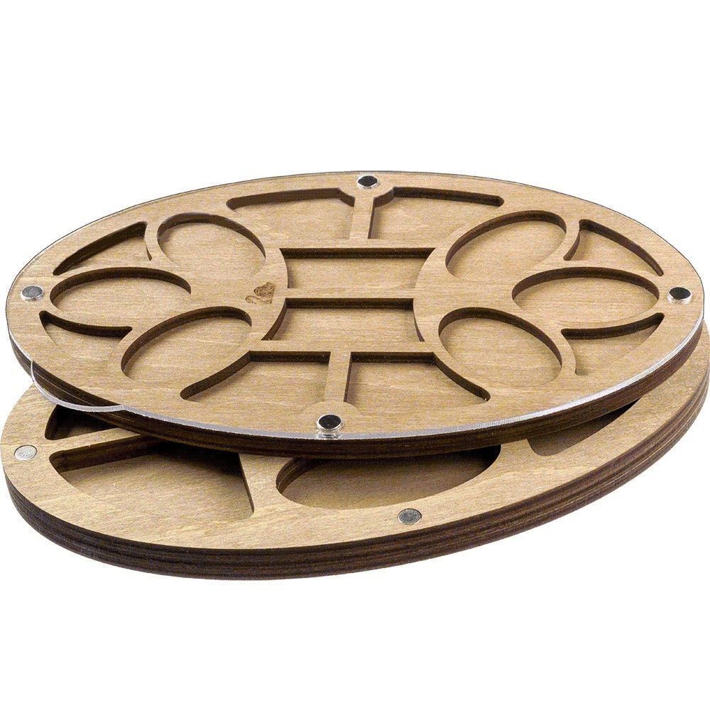 a couple of wooden coasters sitting on top of each other