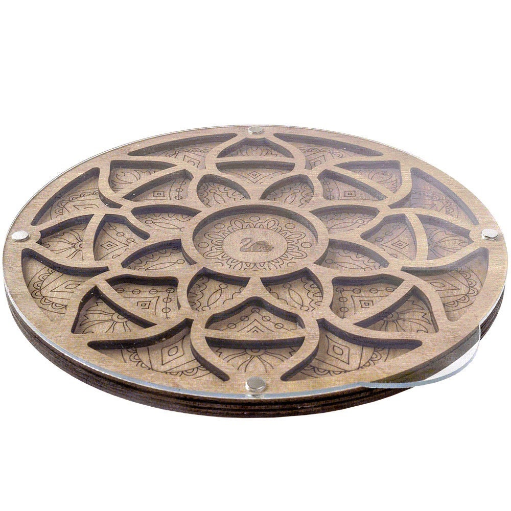 a wooden coaster with a flower design on it