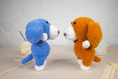 a couple of stuffed animals standing next to each other