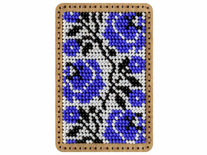 a picture of a blue and white pattern on a wooden frame