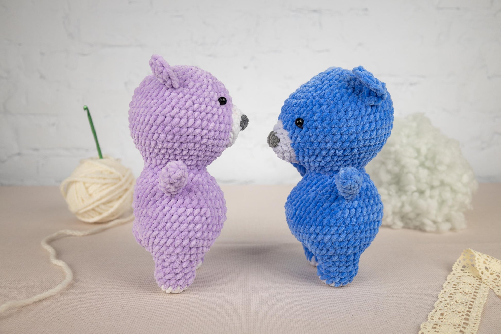 a couple of stuffed animals sitting next to each other