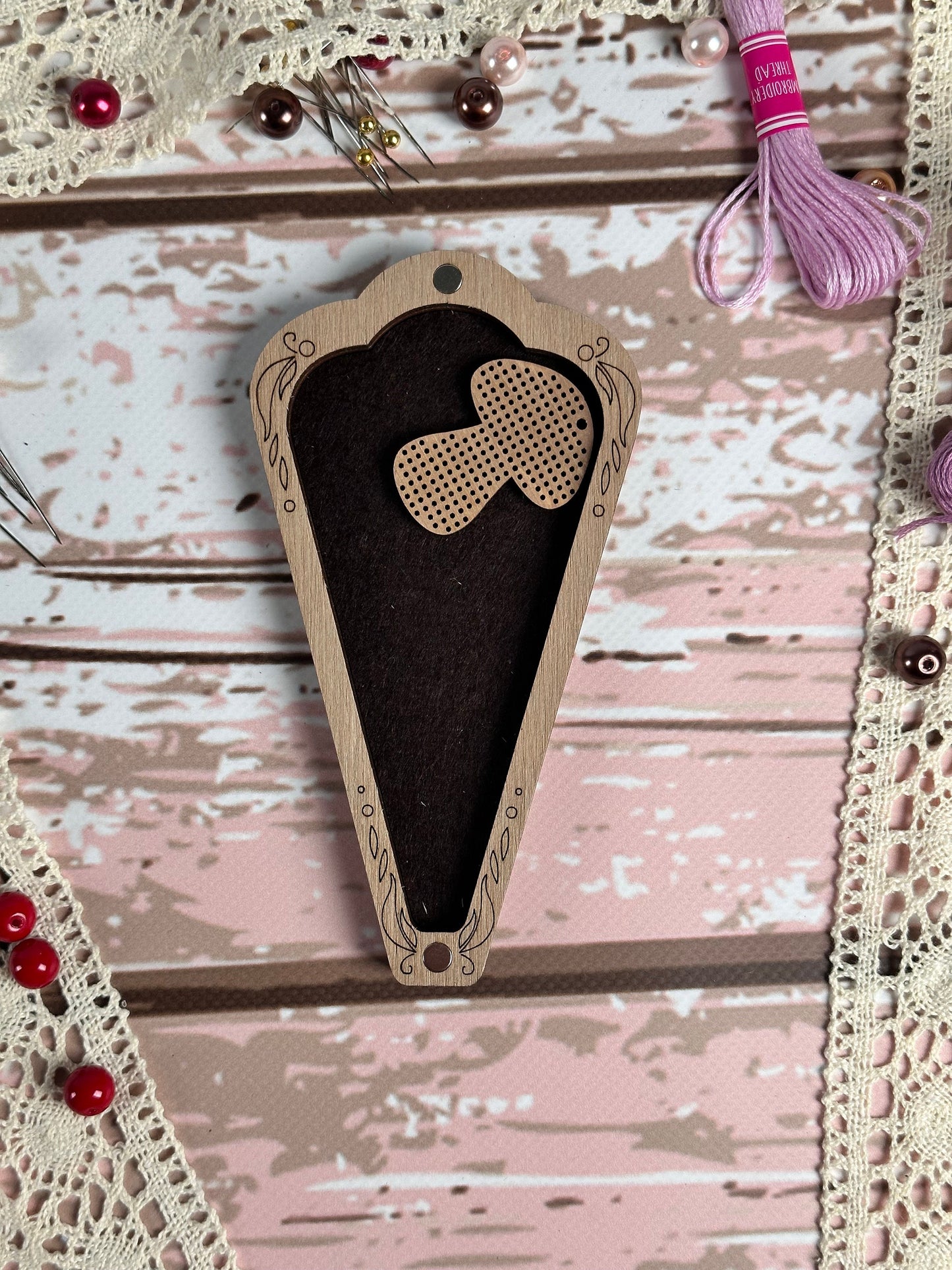 a piece of wood with a heart cut out of it