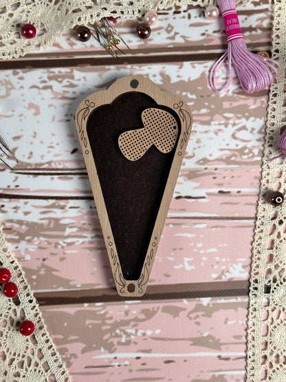 a piece of wood with a heart cut out of it