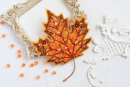 a picture frame with a picture of a leaf on it