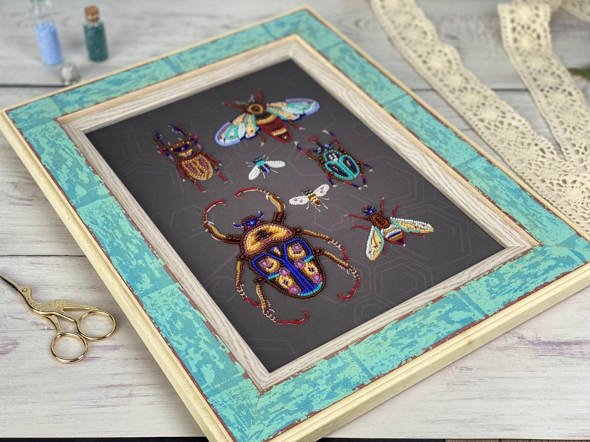 a picture frame with a picture of bugs on it