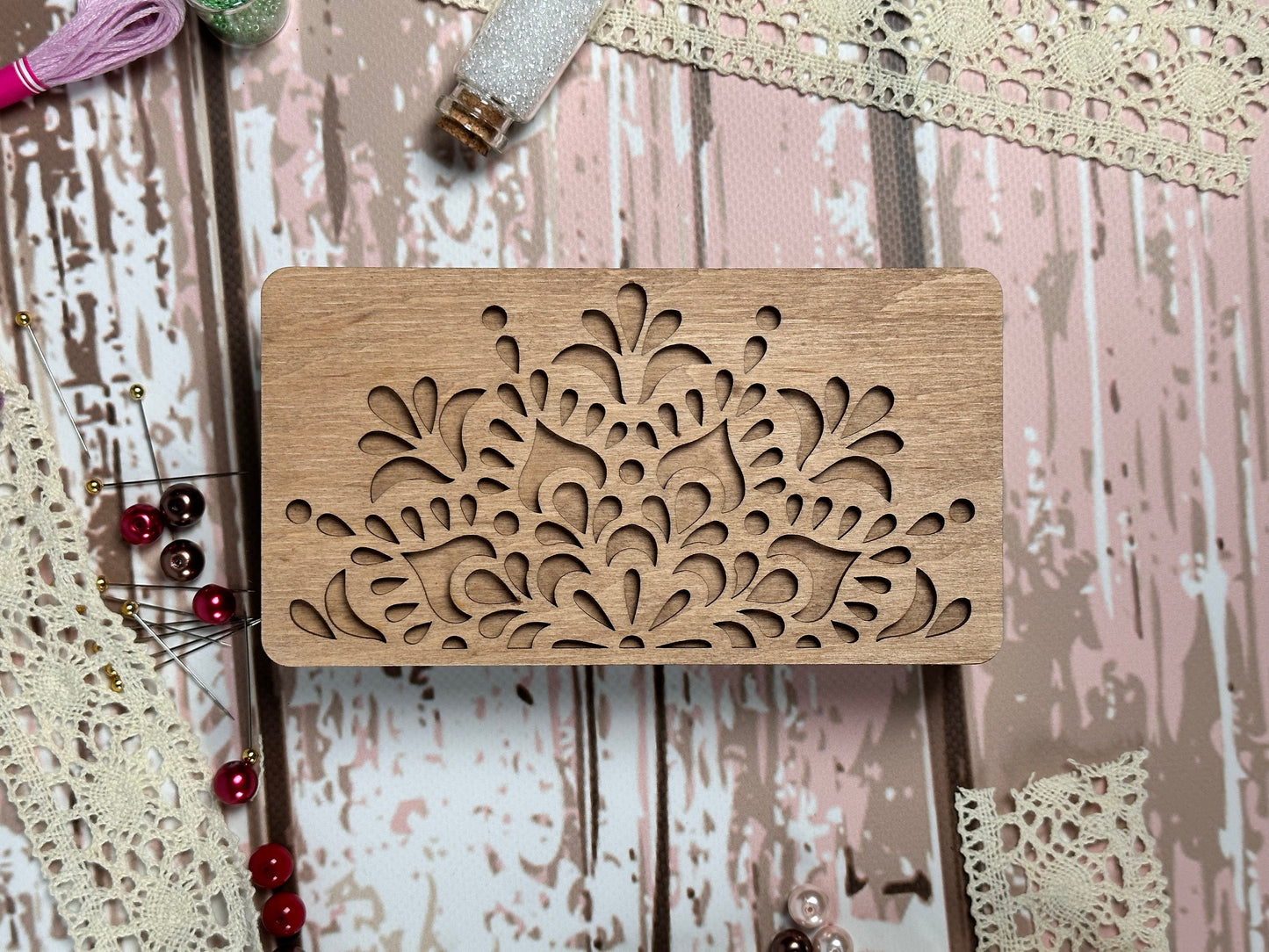 a piece of wood with a design on it