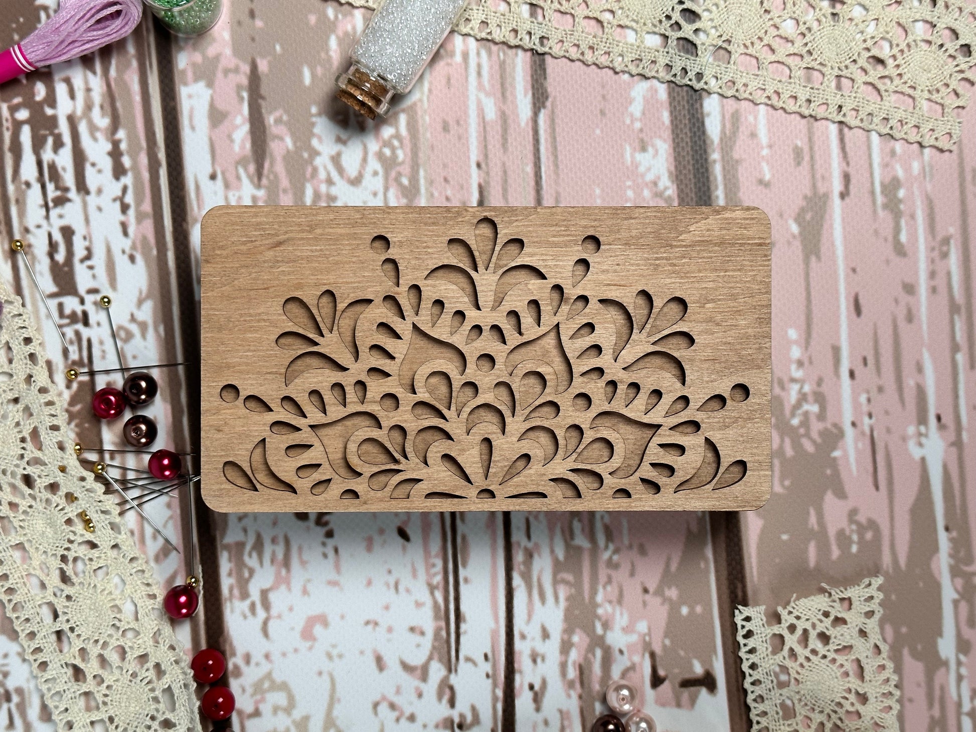 a piece of wood with a design on it