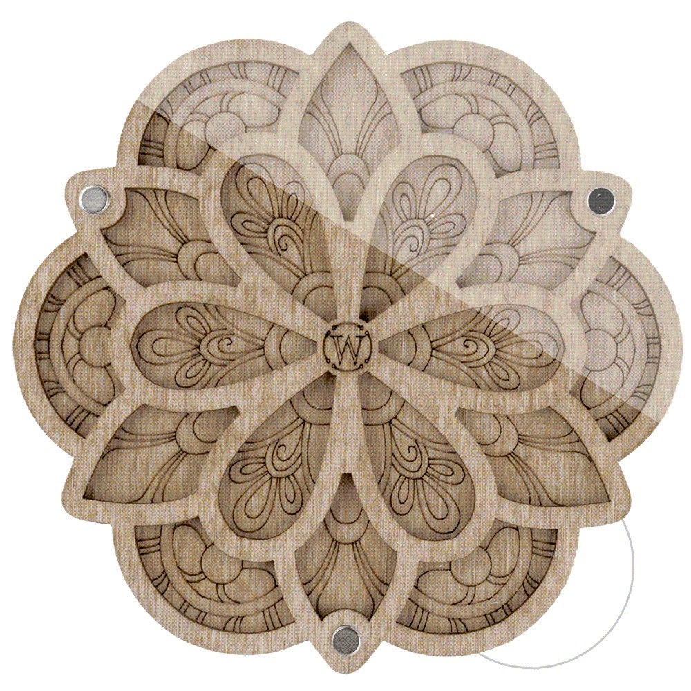a wooden cutout of a flower on a white background