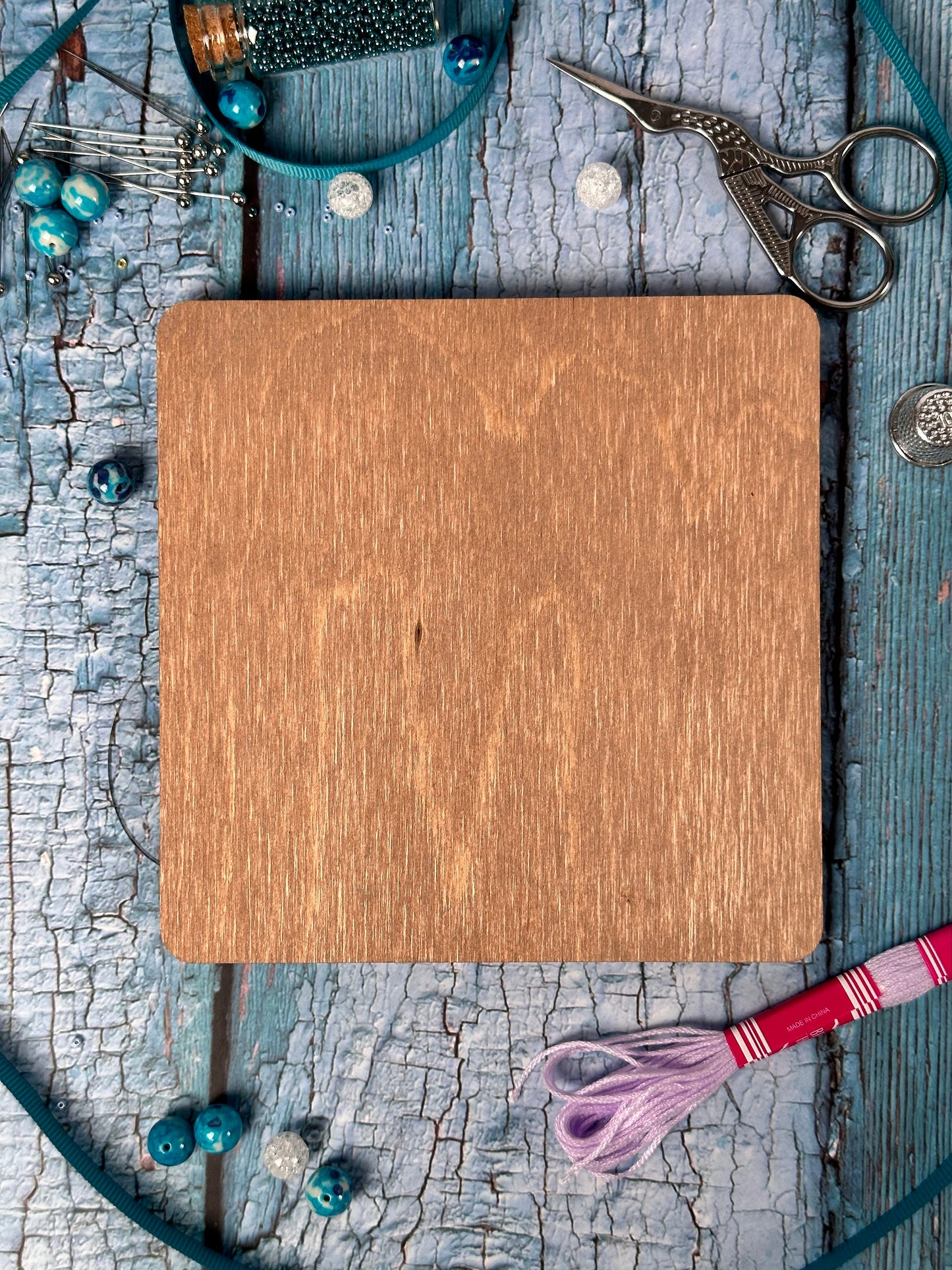 a wooden cutting board sitting on top of a table