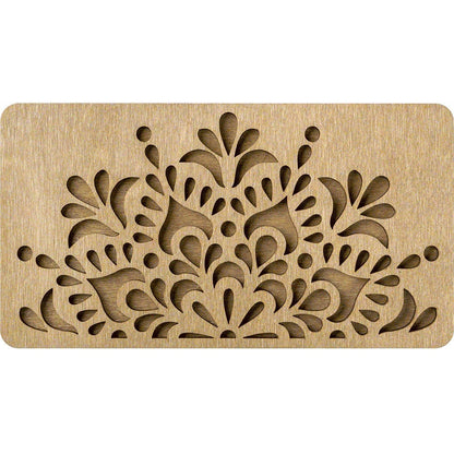 a wooden stamp with an intricate design on it