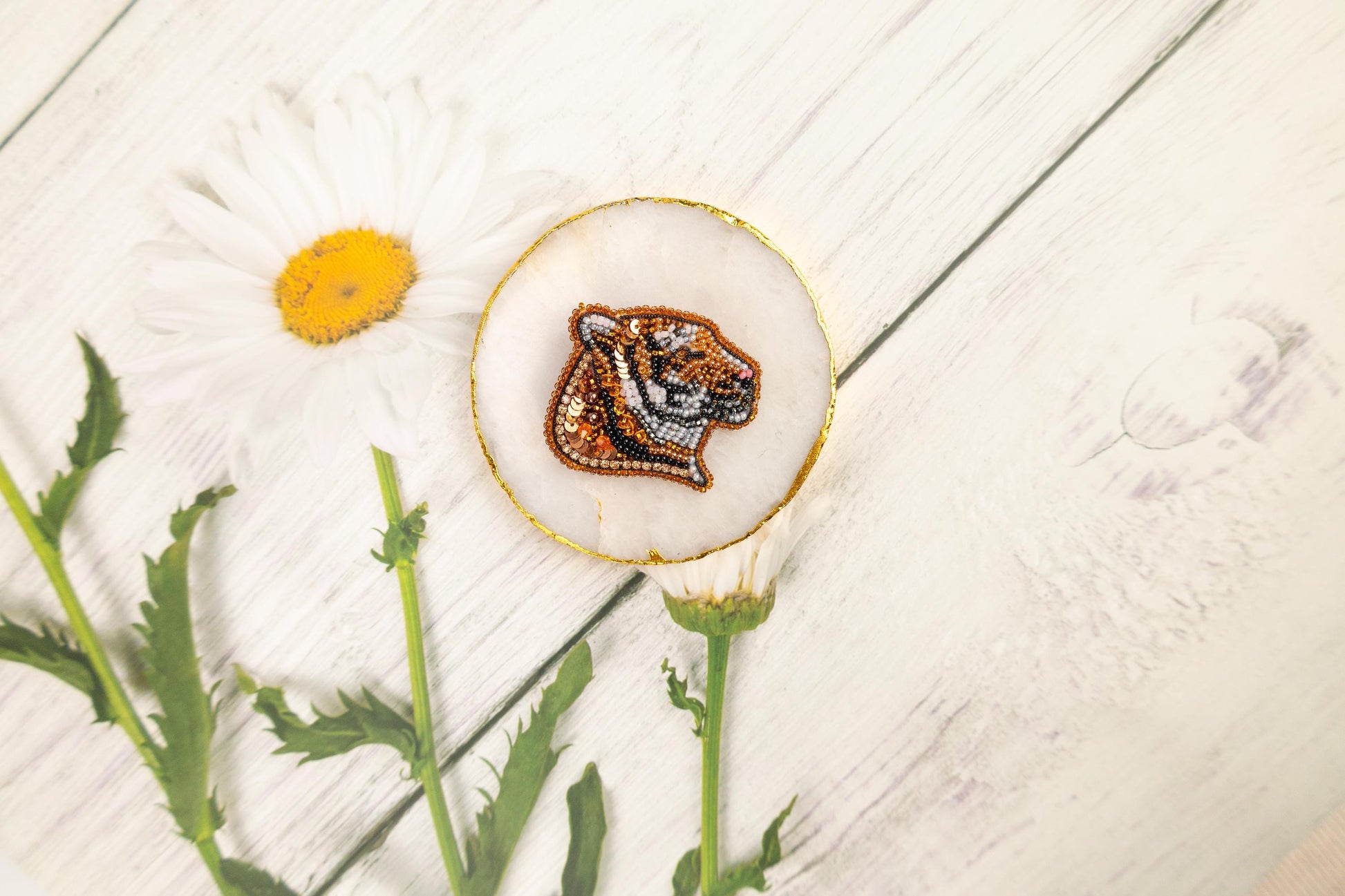 a picture of a tiger on a piece of wood