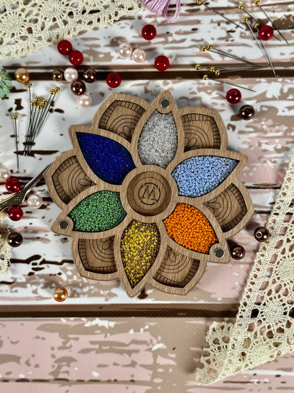 a picture of a flower made out of beads