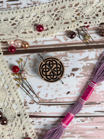 a close up of a piece of cloth with a pin