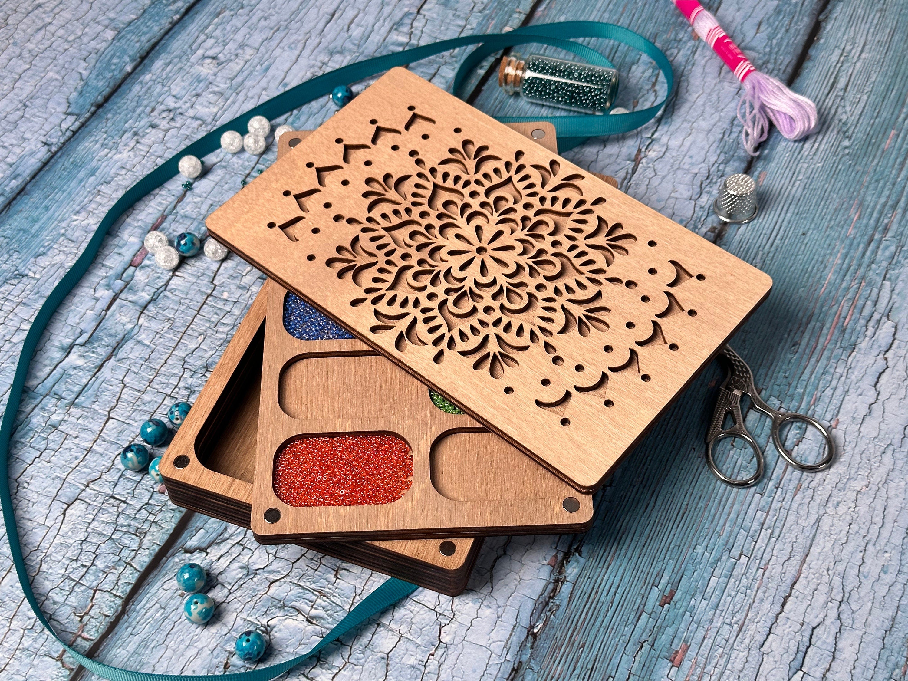a couple of wooden boxes sitting on top of a wooden table