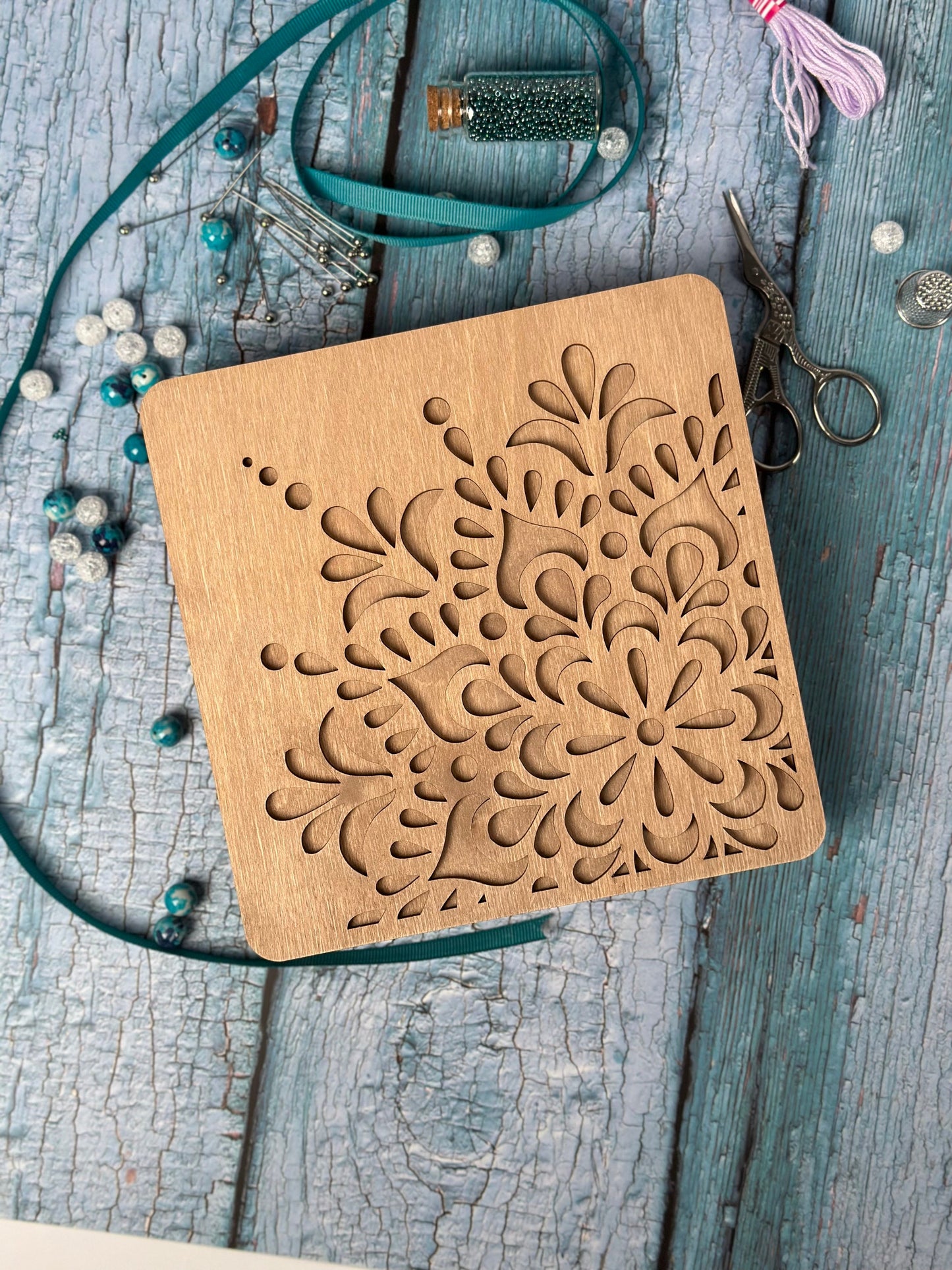 a wooden box sitting on top of a wooden table