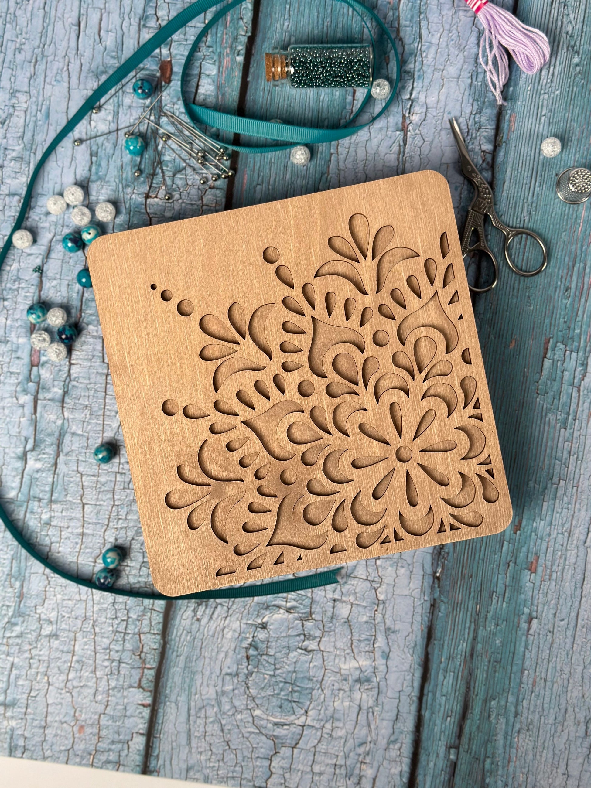 a wooden box sitting on top of a wooden table