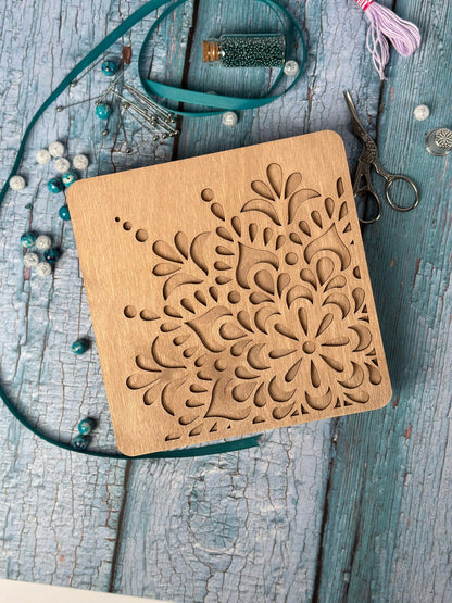 a wooden box sitting on top of a wooden table