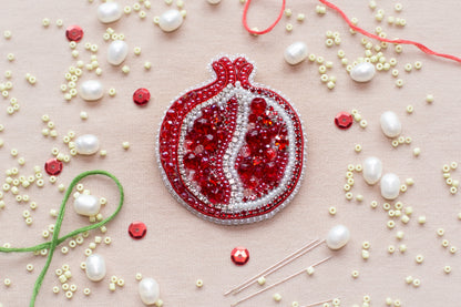 a red ornament sitting on top of a table