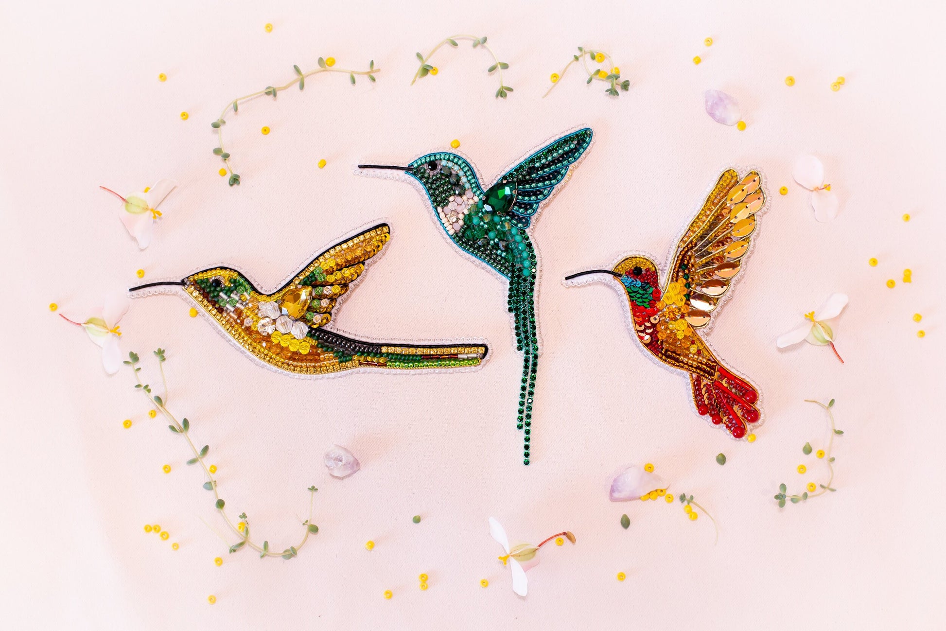 a couple of birds sitting on top of a table