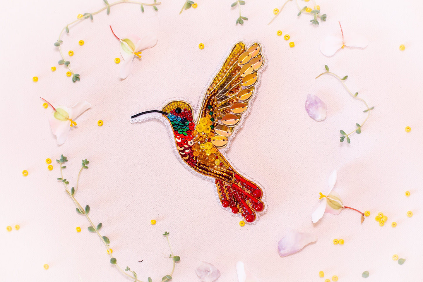 a picture of a hummingbird on a white background