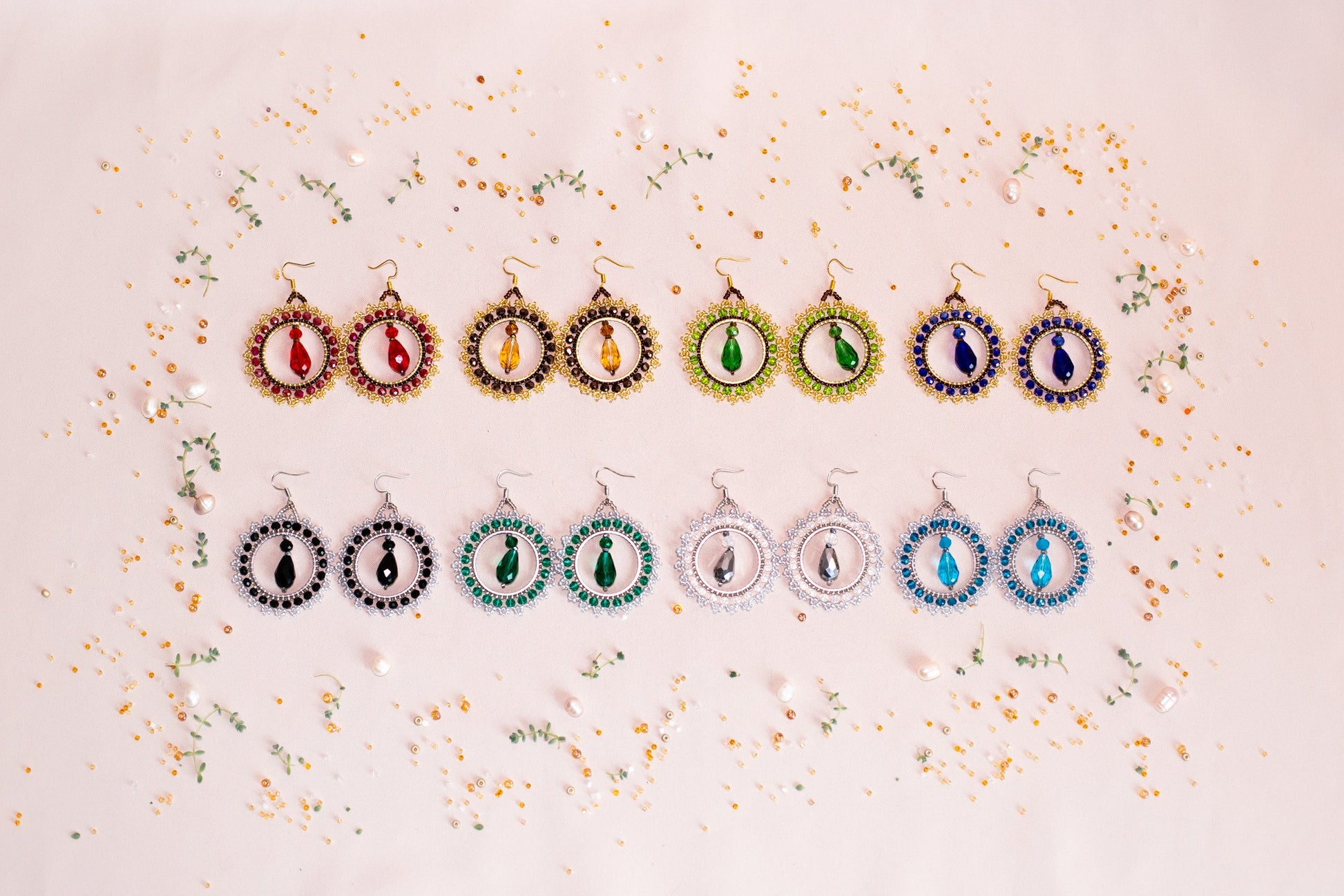 a group of earrings sitting on top of a table