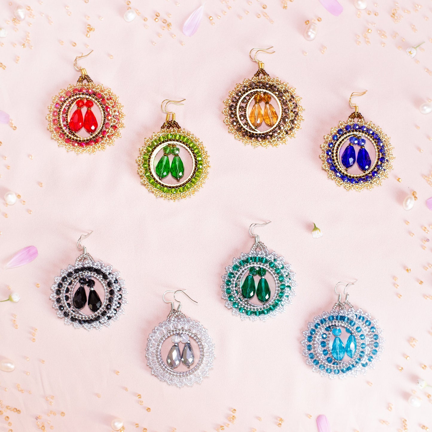 a bunch of earrings that are on a table