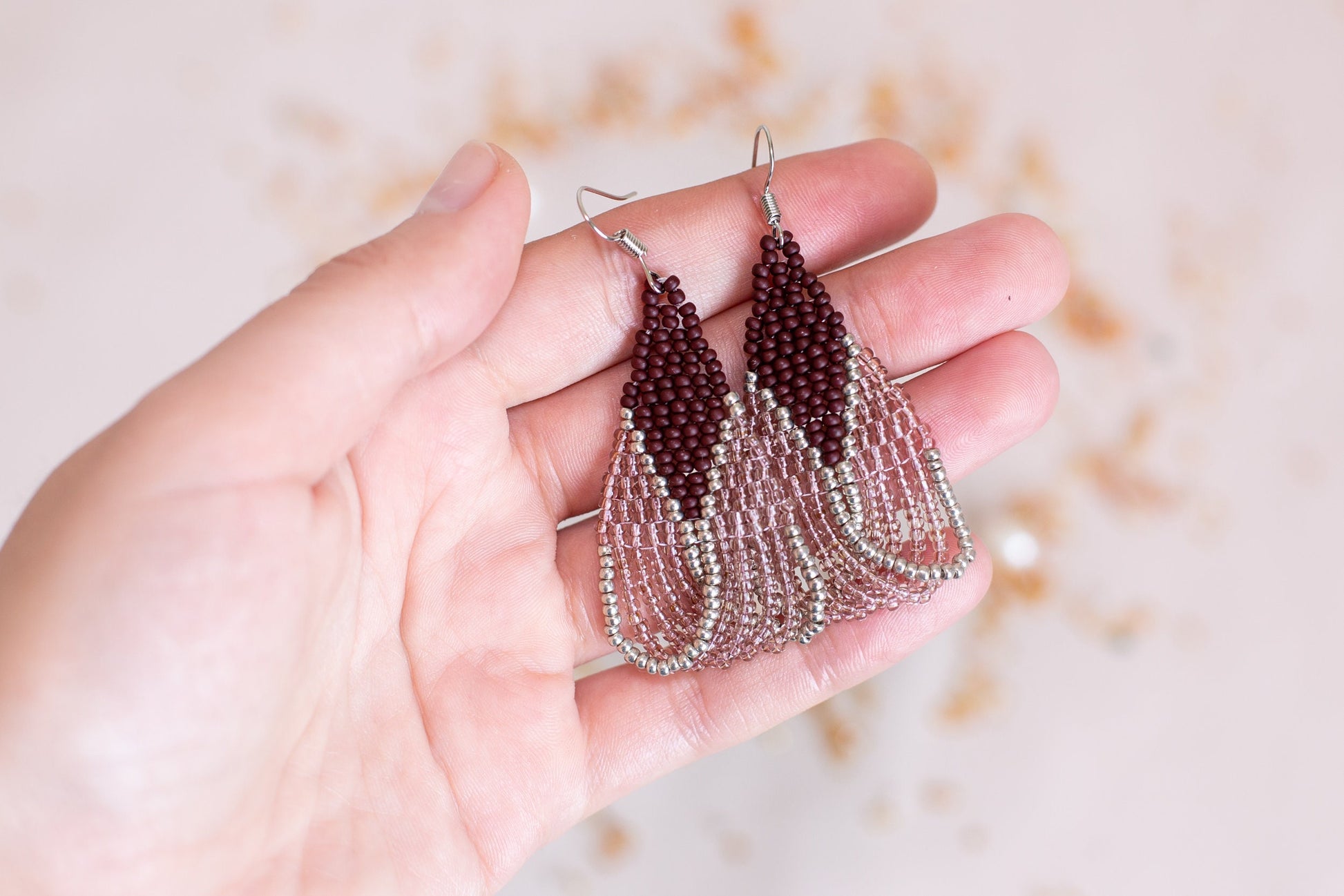 a bunch of earrings that are on a table