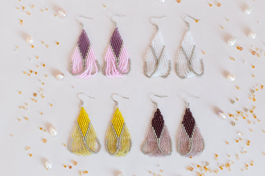 a set of six pairs of beaded earrings