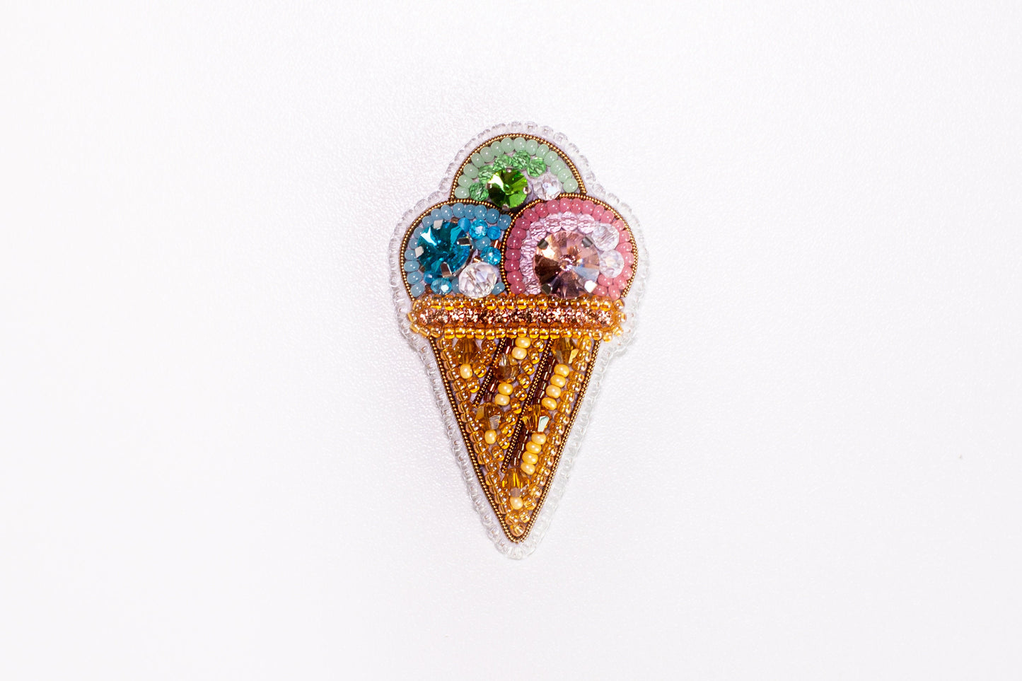 an ice cream cone with a variety of toppings