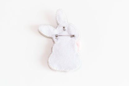 a white rabbit shaped object on a white surface